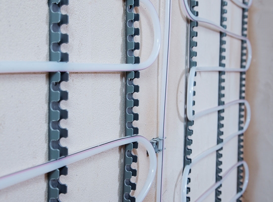Sistemul Uponor Fix 9.9 pentru incalzire si racire prin pereti si tavane