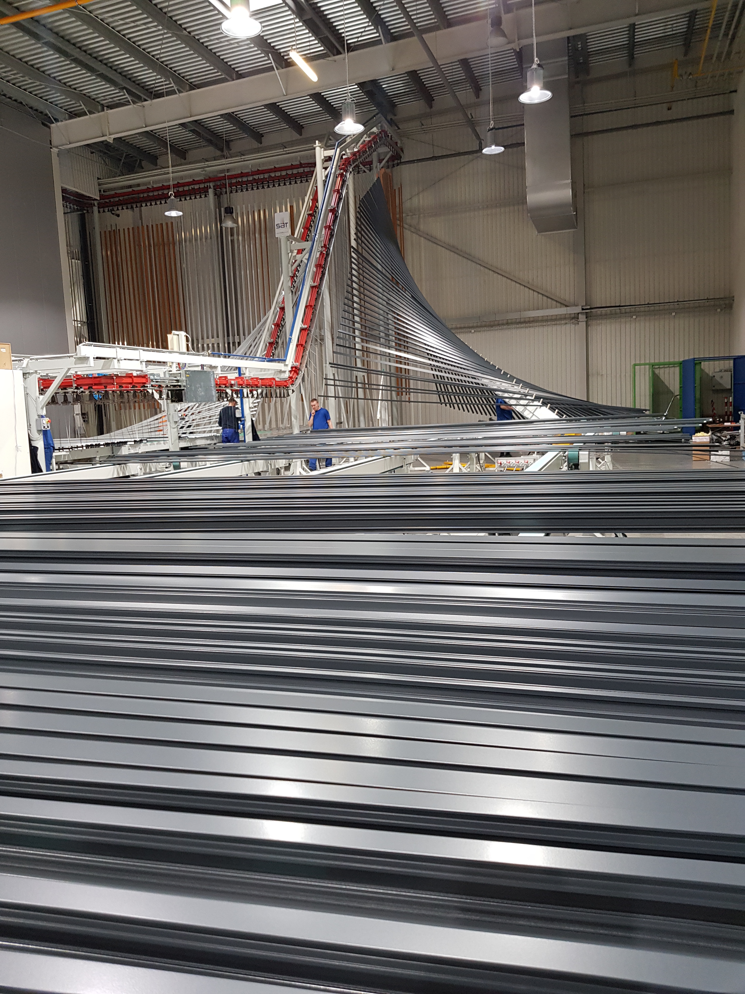 A doua instalatie de vopsire verticala cu particule de pulberi a fost instalata la fabrica Aliplast din Lublin, Polonia