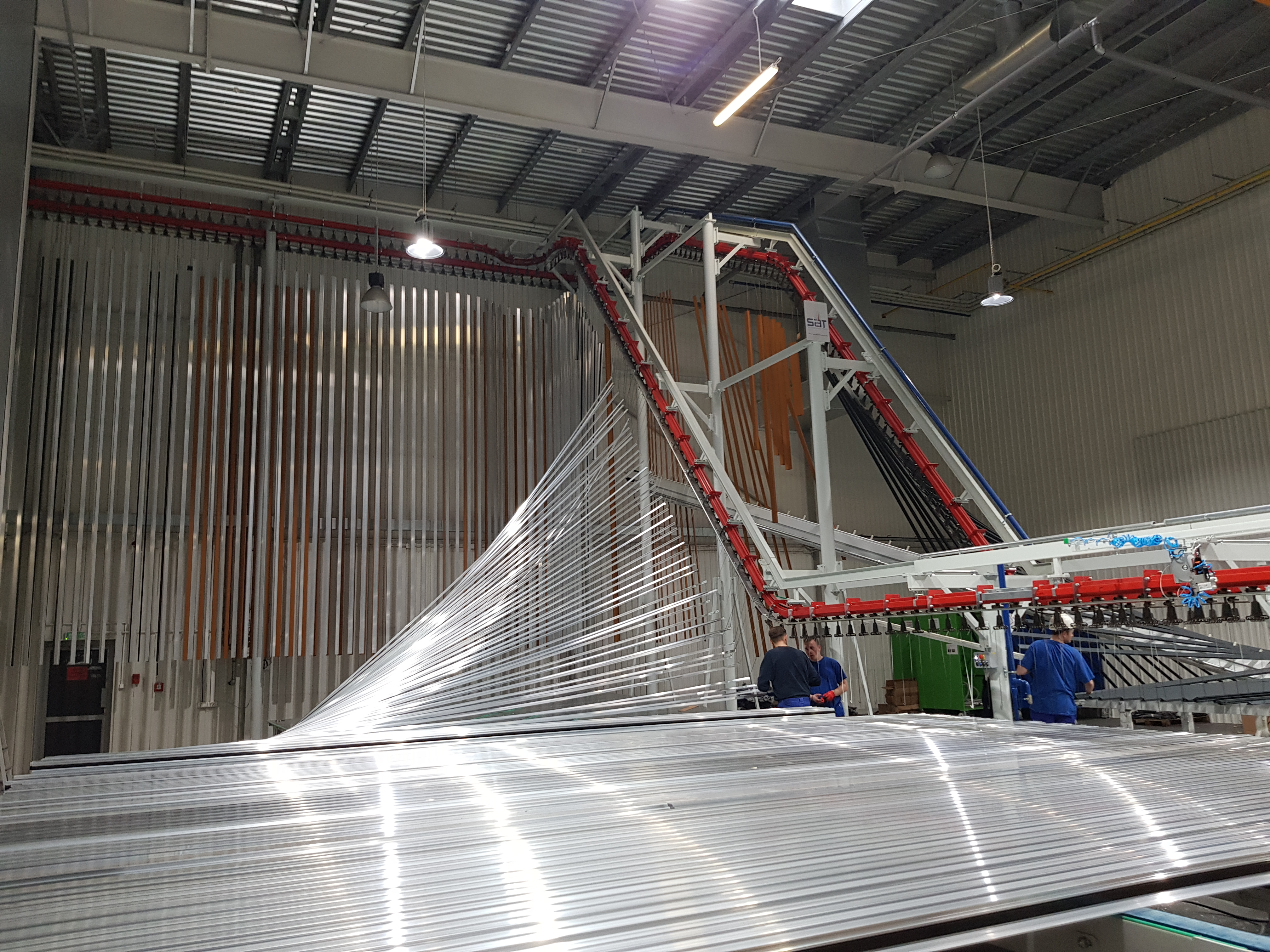 A doua instalatie de vopsire verticala cu particule de pulberi a fost instalata la fabrica Aliplast din Lublin, Polonia