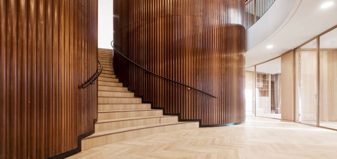 DEKO's minimalist and functional partition solutions in a detailed wooden design