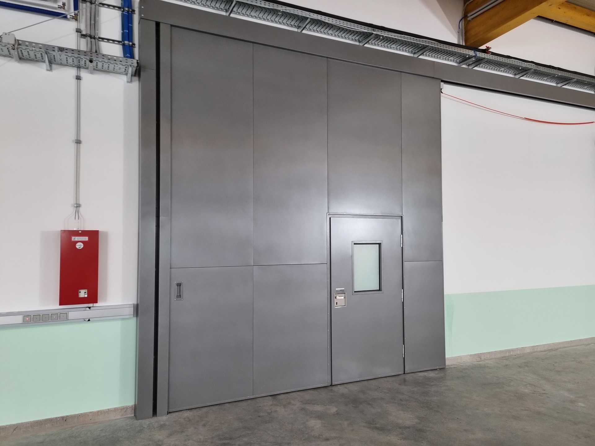 Porti glisante si porti de protectie impotriva incendiilor DOMOFERM realizate pe dimensiuni la comanda