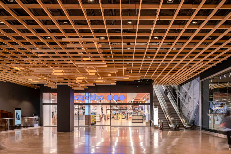 Hunter Douglas Architectural transforms Illa Diagonal interior with Multilayer CombiLine ceiling